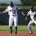 Eastern senior Ben Magsig leads off of second base as Eastern takes on Michigan State at Oestrike Stadium on Wednesday.  Melanie Maxwell I AnnArbor.com